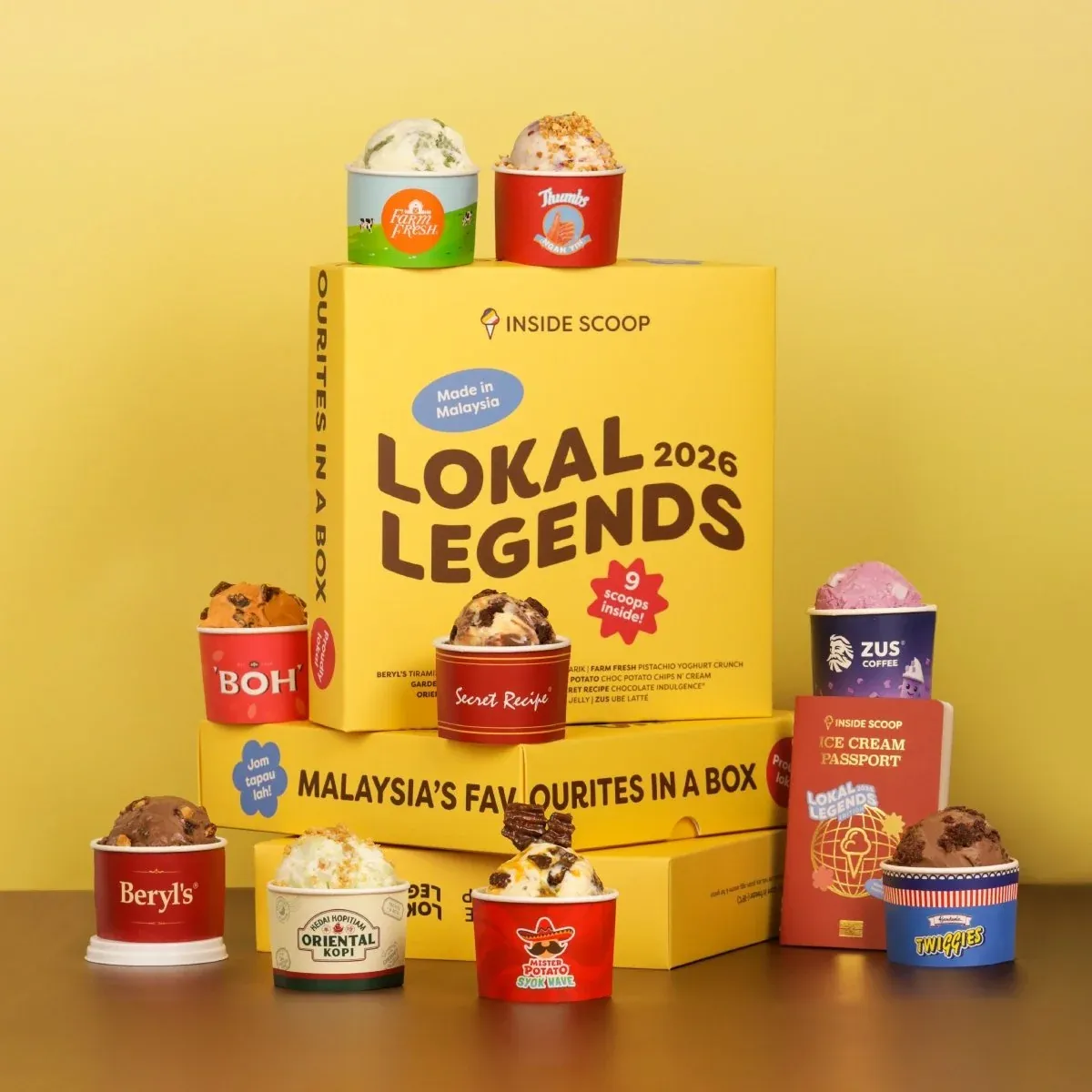Inside Scoop Lokal Legends 2026 campaign artwork showcasing Malaysian brand collaborations as collectible tin cans.